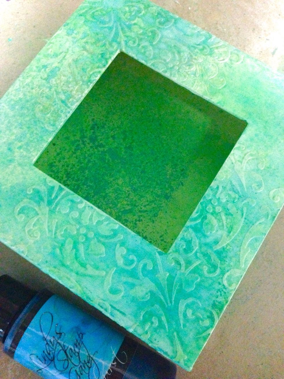 Use a darker shade of blue as an overlay... I'm using LSG starburst Delphinium Turquoise here... Spray over randomly throughout the box...