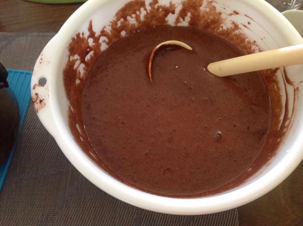 use a deep bowl add the melted choc, and scoop the egg whites in 3 batches, make sure you don't overfold as we would like to have the frothy bits, and slowly add in the cream.