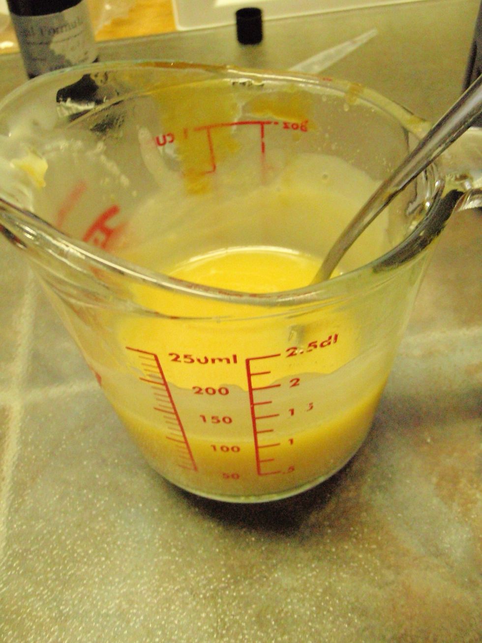 Use a deeply yellow cocoa butter with golden Shea butter and yellow beeswax and it'll look like actual butter!