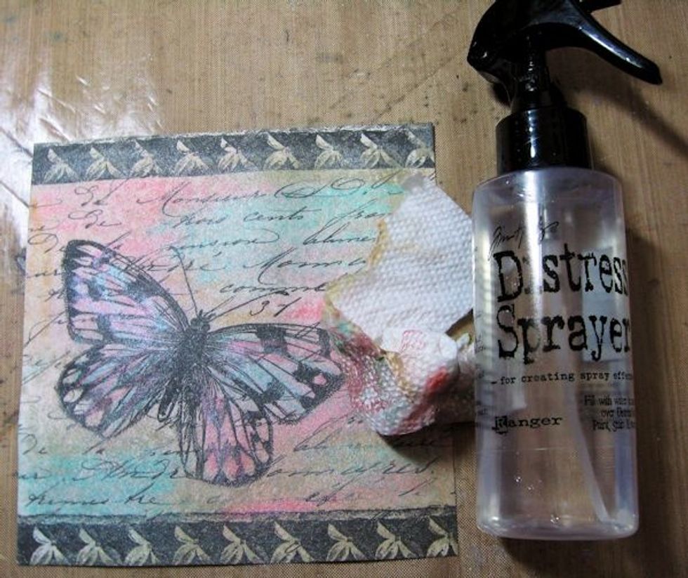 Use a Distress Sprayer to add a very light misting of water to the panel.  Use a paper towel to blend the colors.  Add more color and repeat if desired.