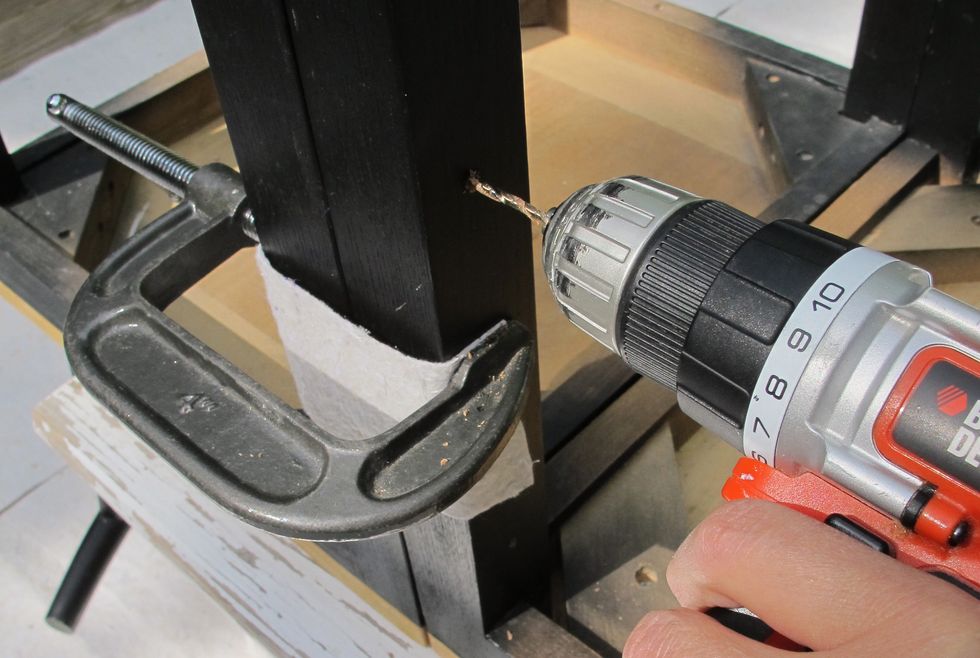 Use a drill bit slightly smaller than the screws you're using to make pilot holes for the screws.