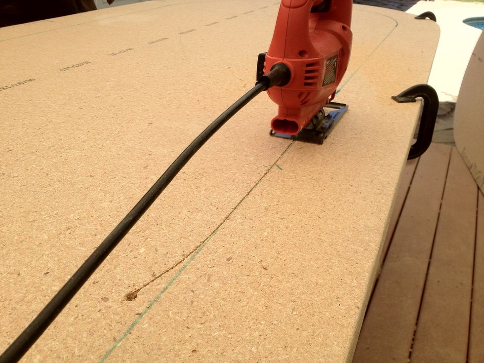 Use a drill to make a starter hole and follow your line. The inside piece of this sheet will be discarded, so don't worry about the middle, focus on your lines and cut smooth and slow.