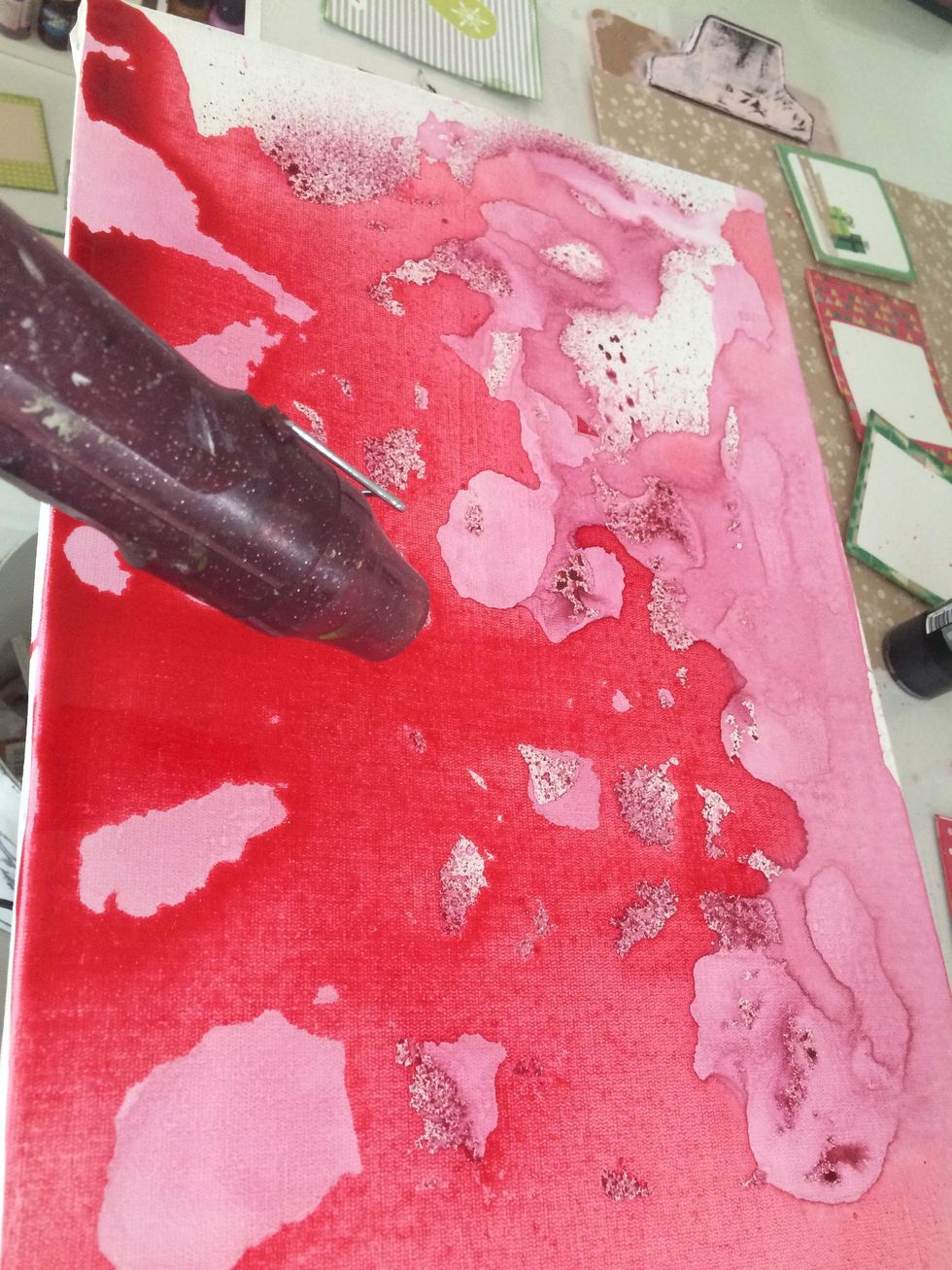 Use a embossing heat tool to dry the ink.