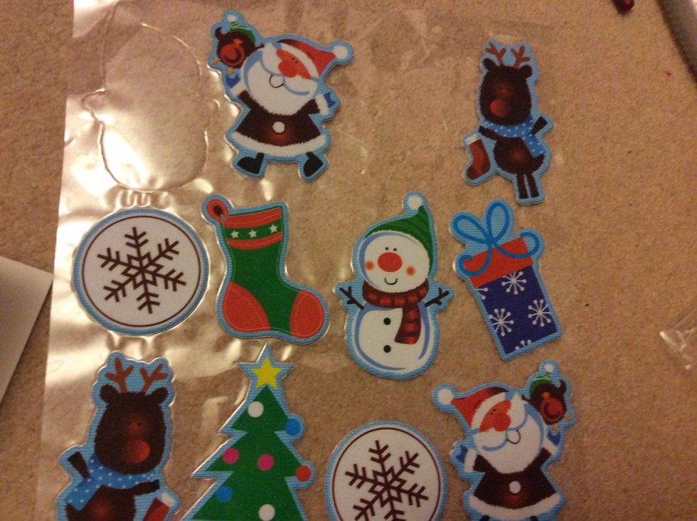 Use a festive sticker or glue on a Christmas card design.