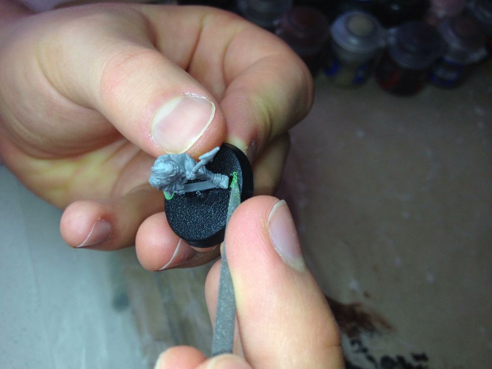 Use a file to flatten the green stuff. Make sure you clean the file afterwards.