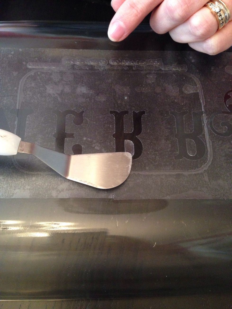 Use a fine blade or lifting tool to assist with placement as needed.