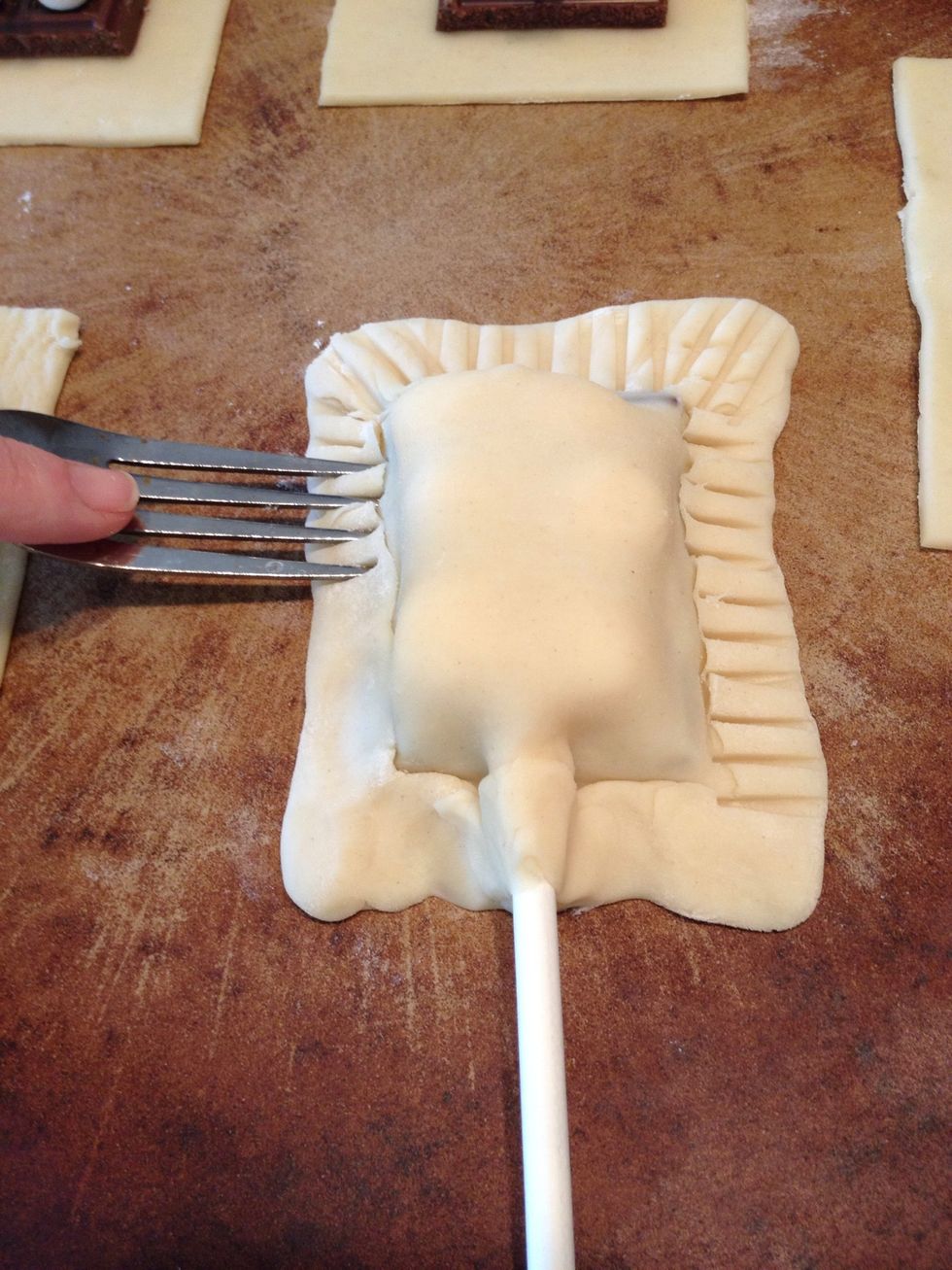 Use a fork to decorate the edges.