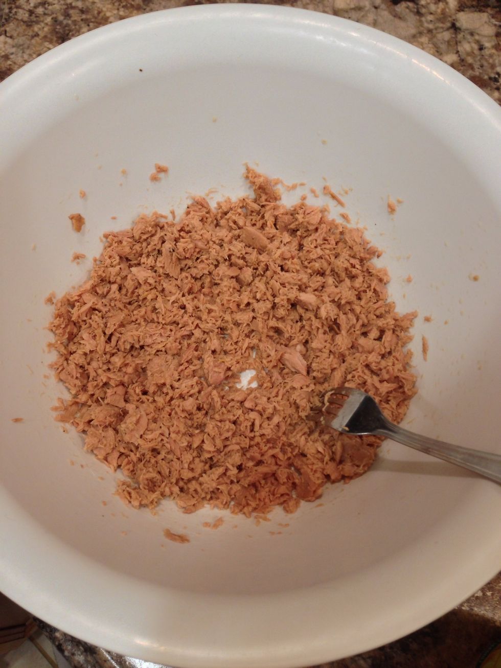 Use a fork to flake the tuna apart like so