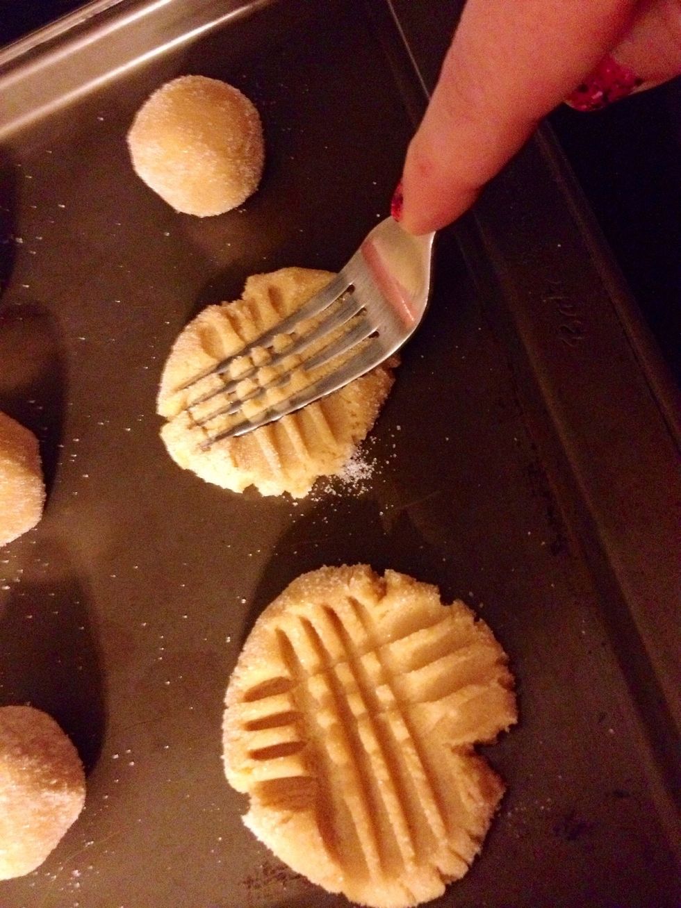Use a fork to press down dough (in a criss-cross pattern).