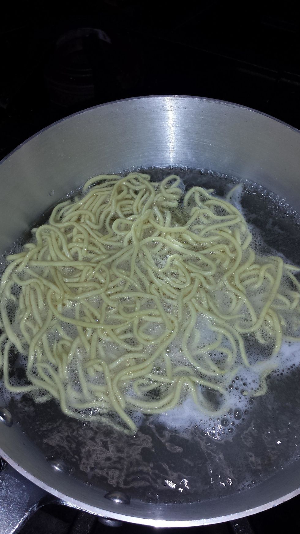 Use a generous amount of boiling water and cook for about 2 minutes. If you use a lot of starch to keep them from sticking...your water will eventually get a bit thick and need to be changed.