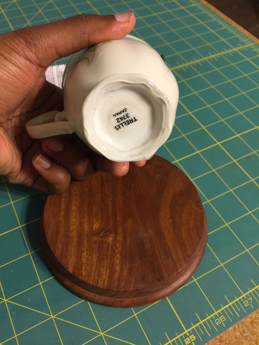 Use a generous amount of E6000 adhesive to seal your base and teacup.