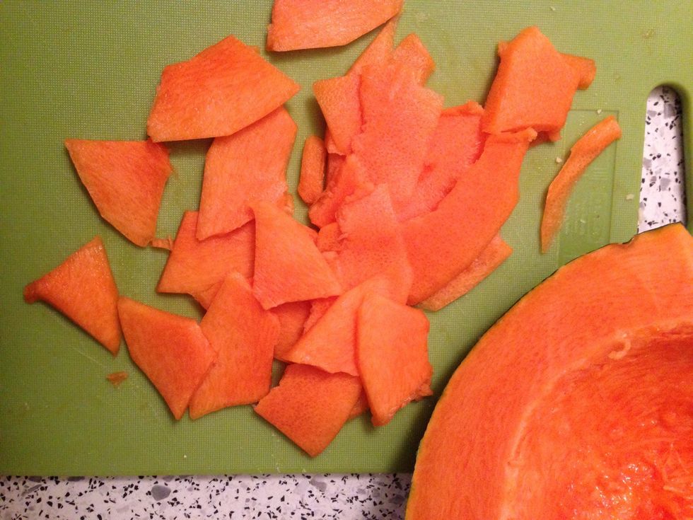 Use a grater to cut the squash into slices.