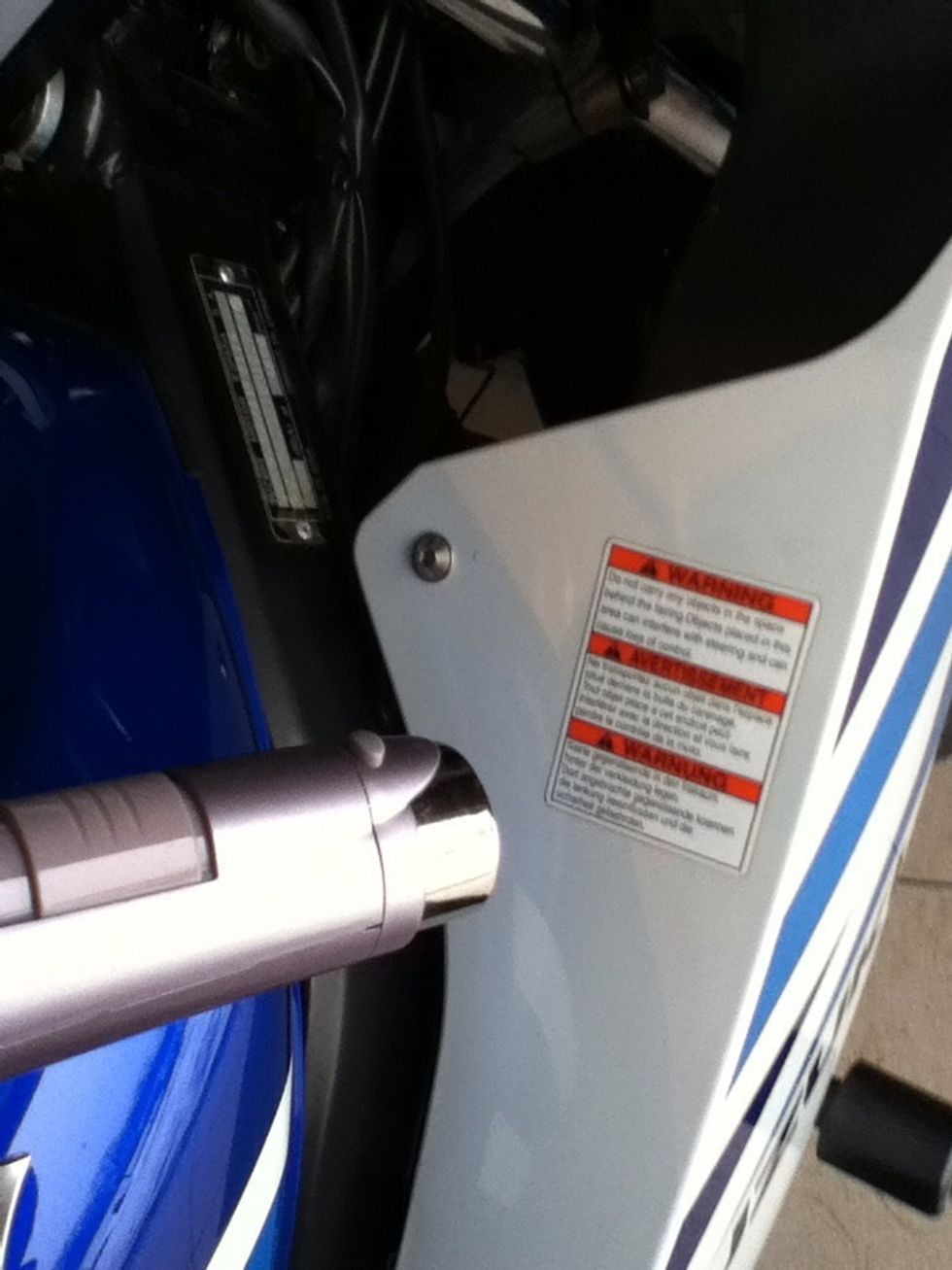 Use a hair dryer to heat the surface of the sticker.