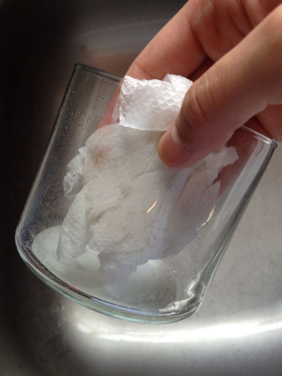 Use a kitchen paper towel so you don't have to worry about leaving sticky stuff on your dish sponge.