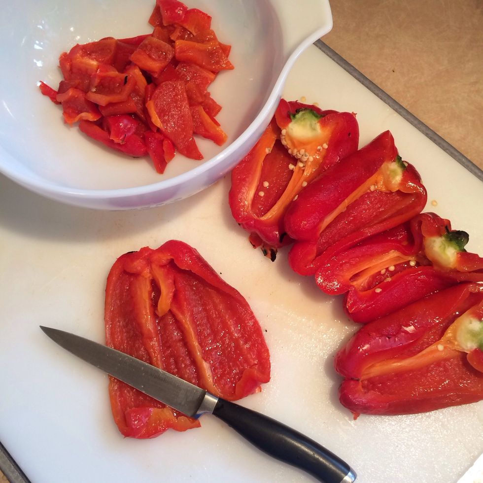 Use a knife to cut peppers in half and remove the tops and spines. Rinse over the sink to remove seeds. Cut into pieces and place back into bowl and set aside.