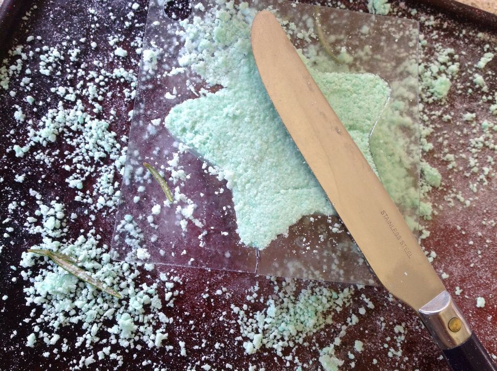 Use a knife to even up the back of the mould.