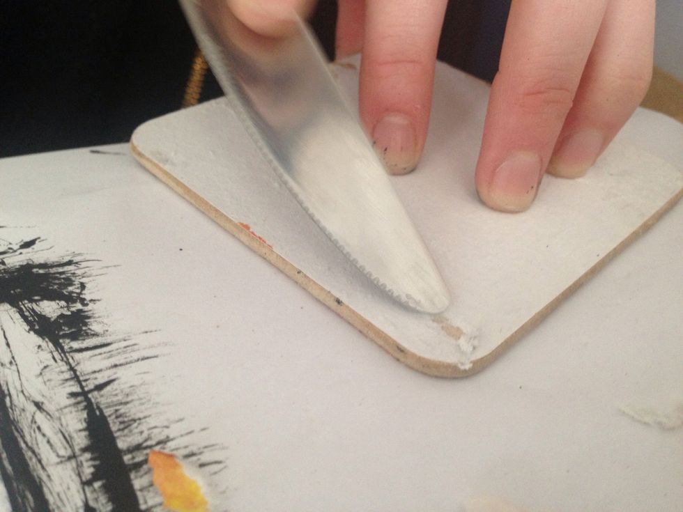 Use a knife to get the really tough bits