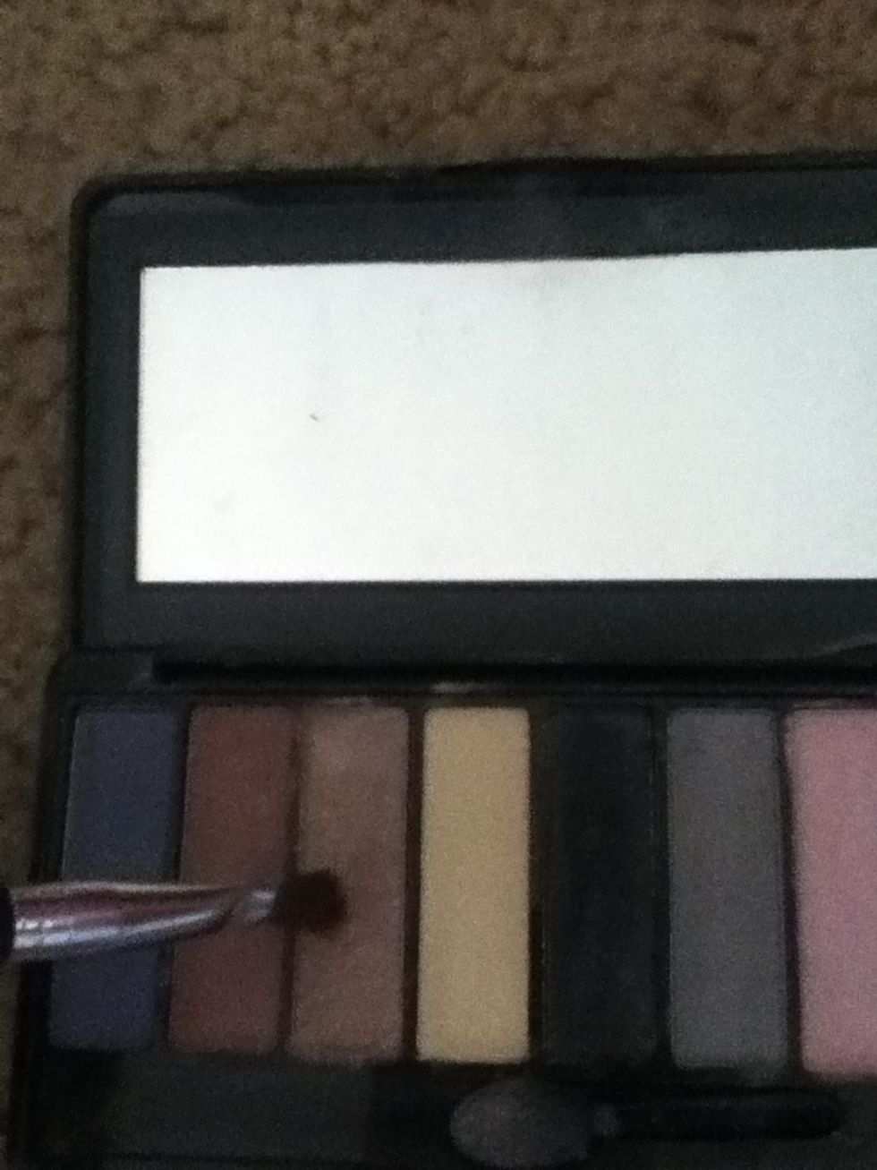 Use a light golden brown color for your bottom Eye shadow:)