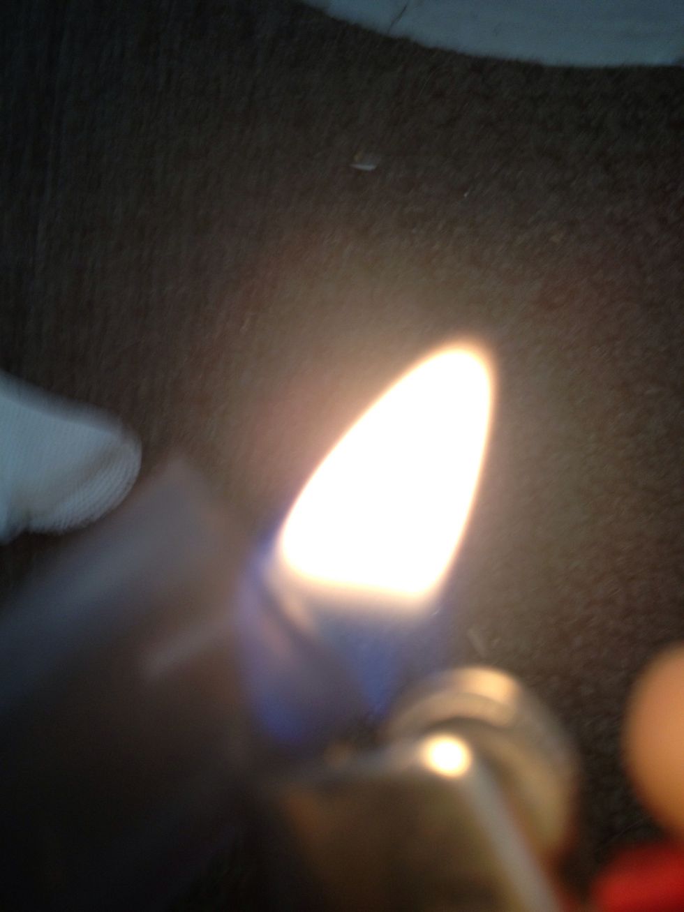 Use a lighter to melt the end of large tube