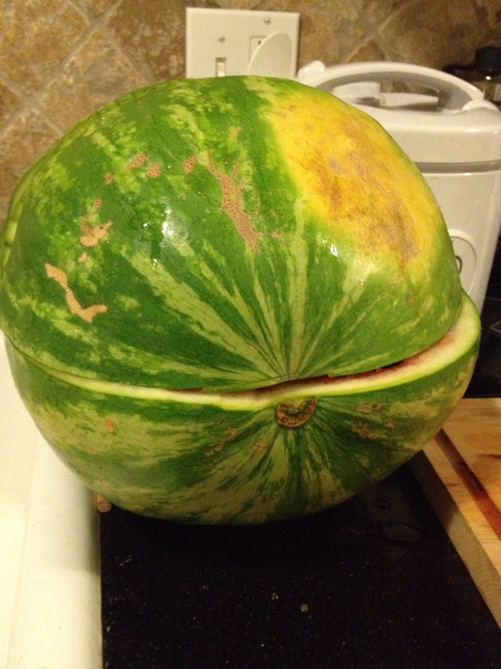 Use a marker pen draw the basket shape. Cut left and right side of water melon out and do the detail later.