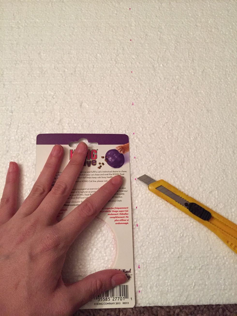 Use a metal ruler and push your box knife into the board. Sawing shreds the material into pieces. It's all about being straight with these boards... And yes, I improvised on the ruler.