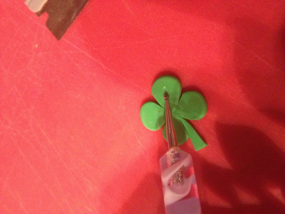 Use a needle or ball tool to make lines on the leaves