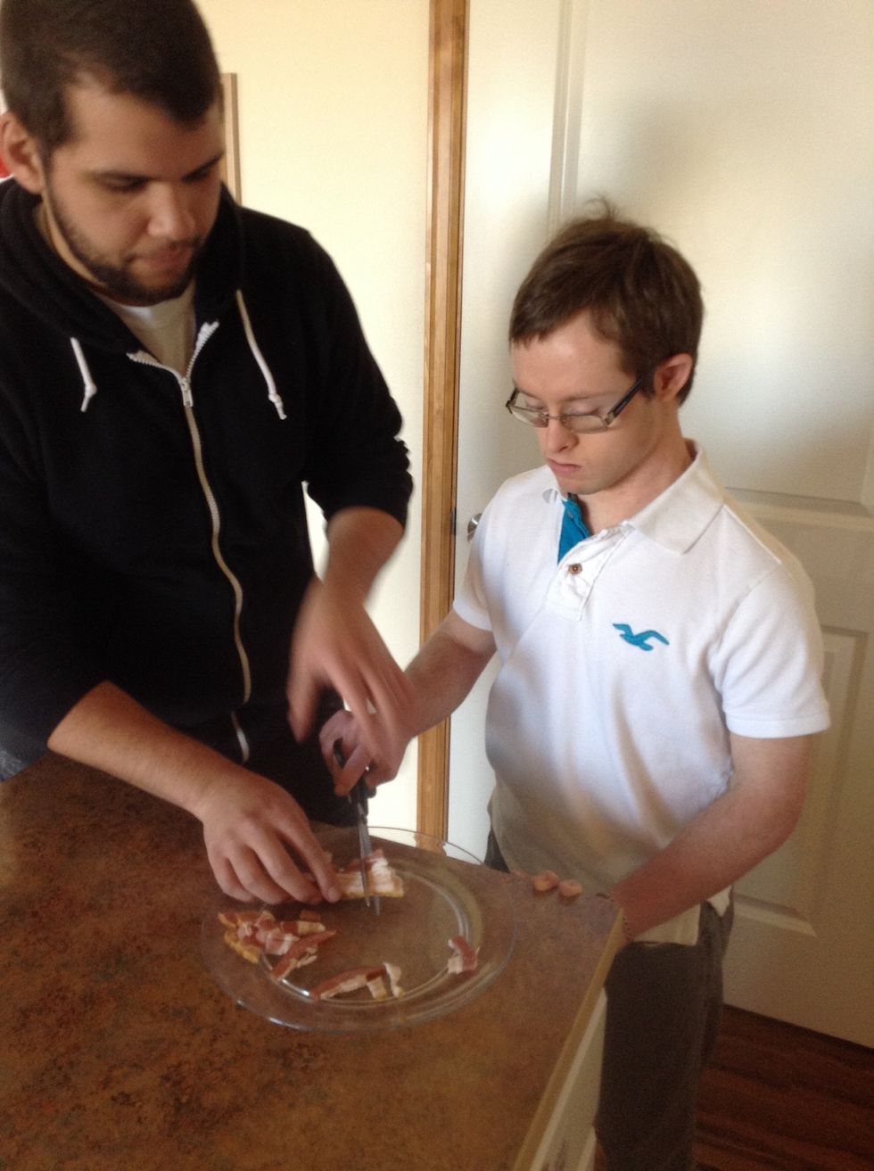 Use a pair of kitchen scissors to cut the bacon into bit sized pieces