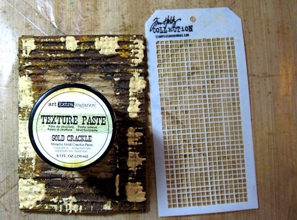 Use a palette knife and Tim Holtz Linen Stencil to randomly apply Prima Gold Crackle Texture Paste around the edges of the panel. Set aside to dry.  You get better crackle if you let dry naturally.