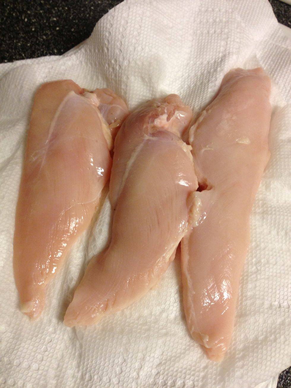 Use a paper towel to pat chicken dry.