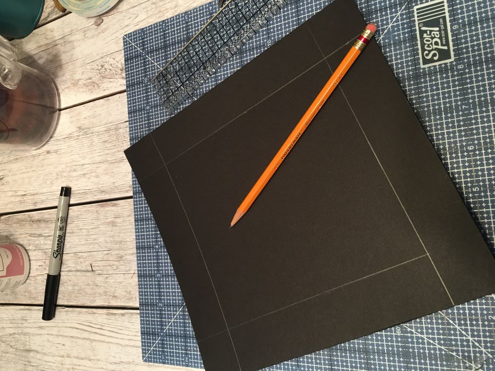 Use a pencil & ruler and measure and mark 1 1/4" from all 4 sides as shown.