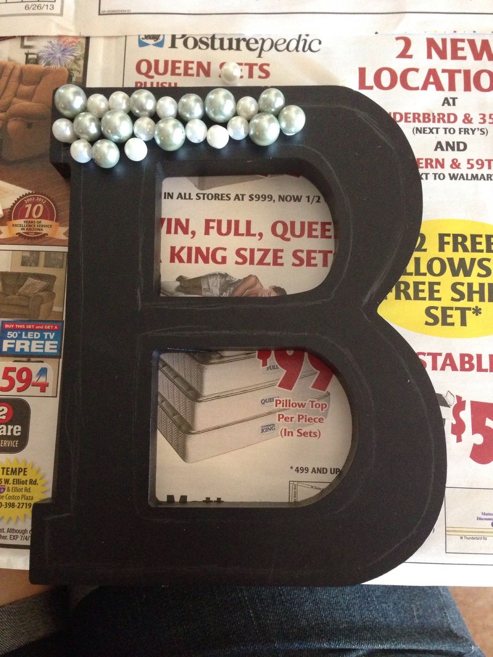 Use a pencil to mark where you want the edge of the beads to be.