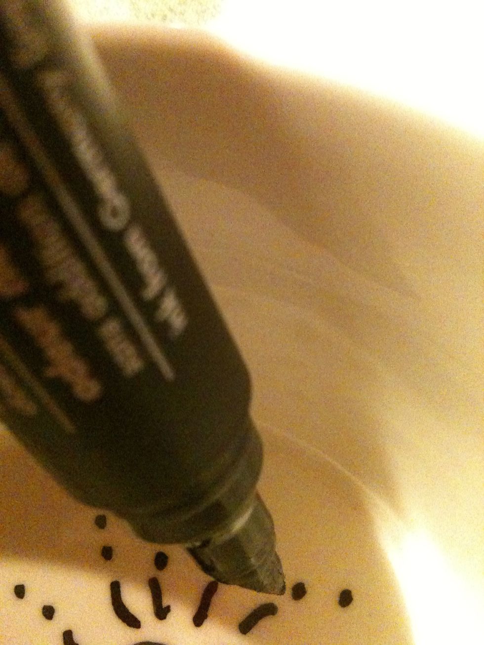 Use a permanent marker to draw.