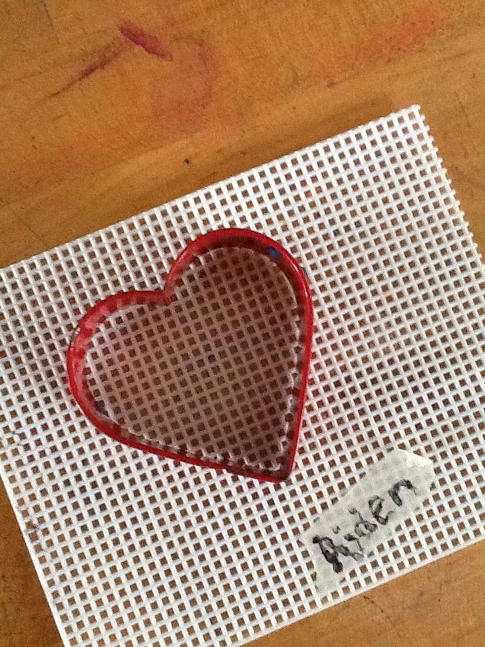 Use a piece of plastic screen,( typically used for stitchery crafts), and a cookie cutter as your paper mold. Simple cookie cutters work best.