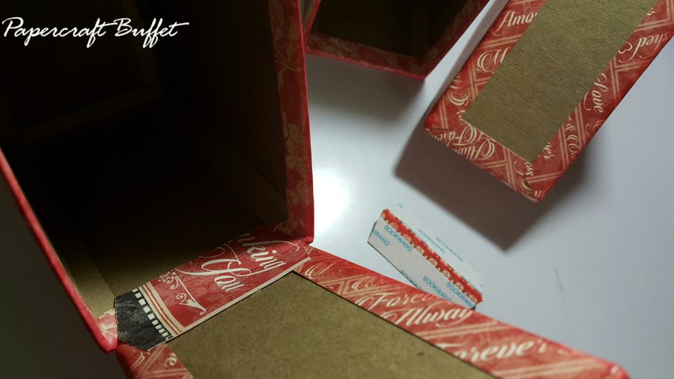 Use a piece of scraps to connect the holder and the box.