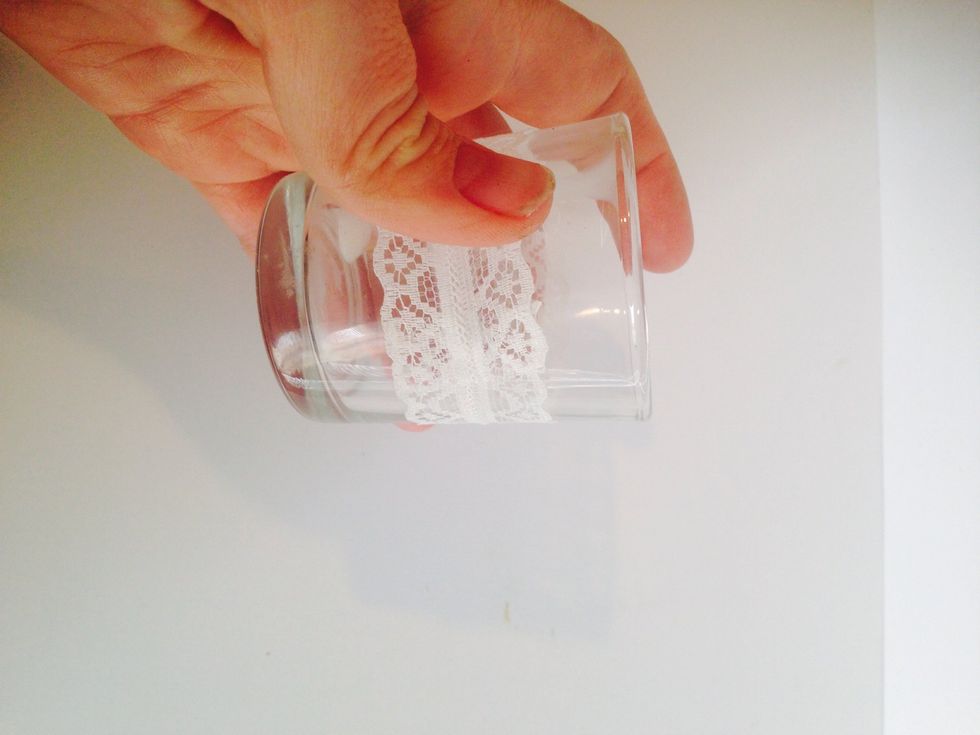 Use a piece of small lace to measure around each of the 2 inch votives.