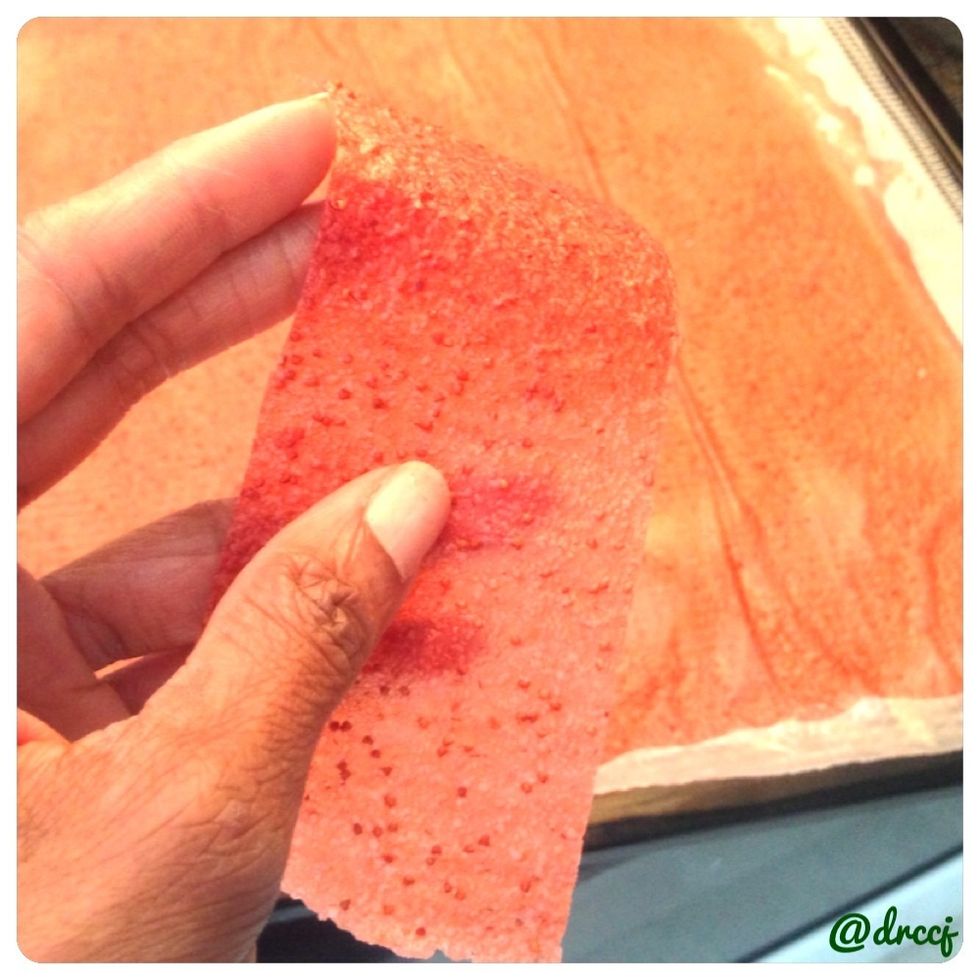 Use a pizza cutter to cut long strips. Remove parchment paper from fruit roll ups, if wax paper used for dehydration. If not, simple cut into strips.