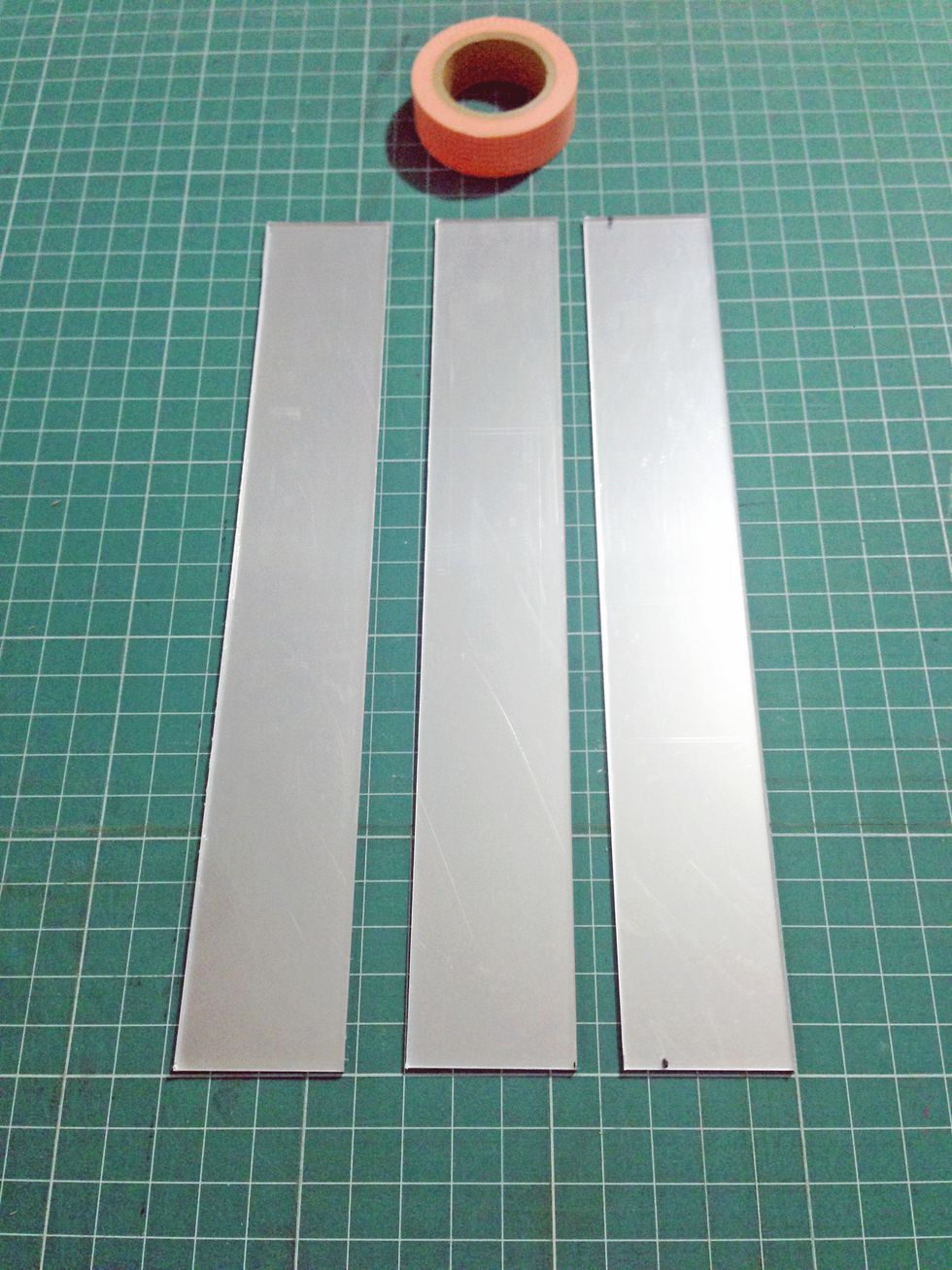 Use a plastic cutter, cut 3 strips of 1.5" by 9" acrylic mirrors... This is based on a kitchen roll with a diameter of 1.75" and 9" in height... Adjust accordingly when necessary...