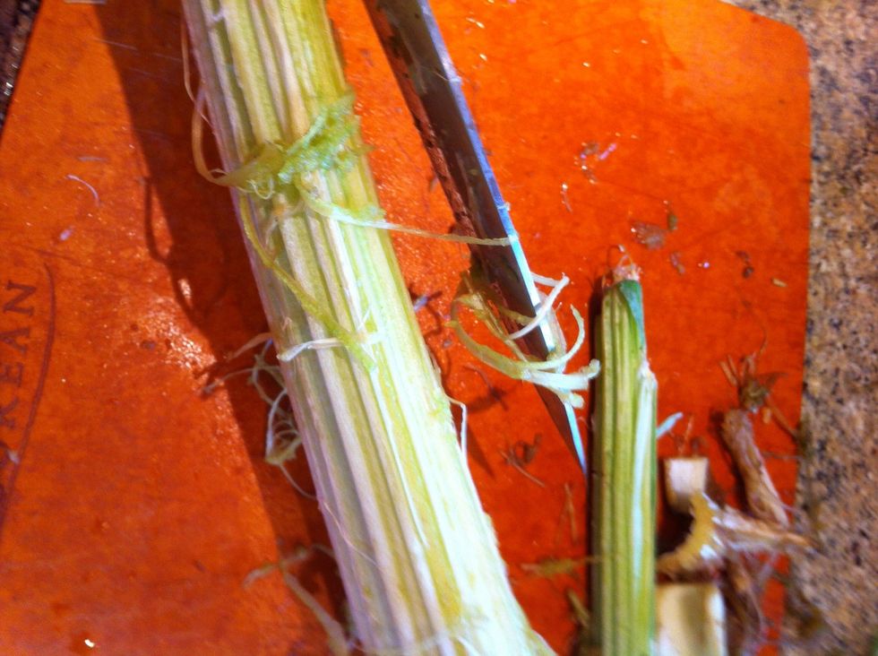 Use a potato peeler or knife to remove the stringy exterior ribs.