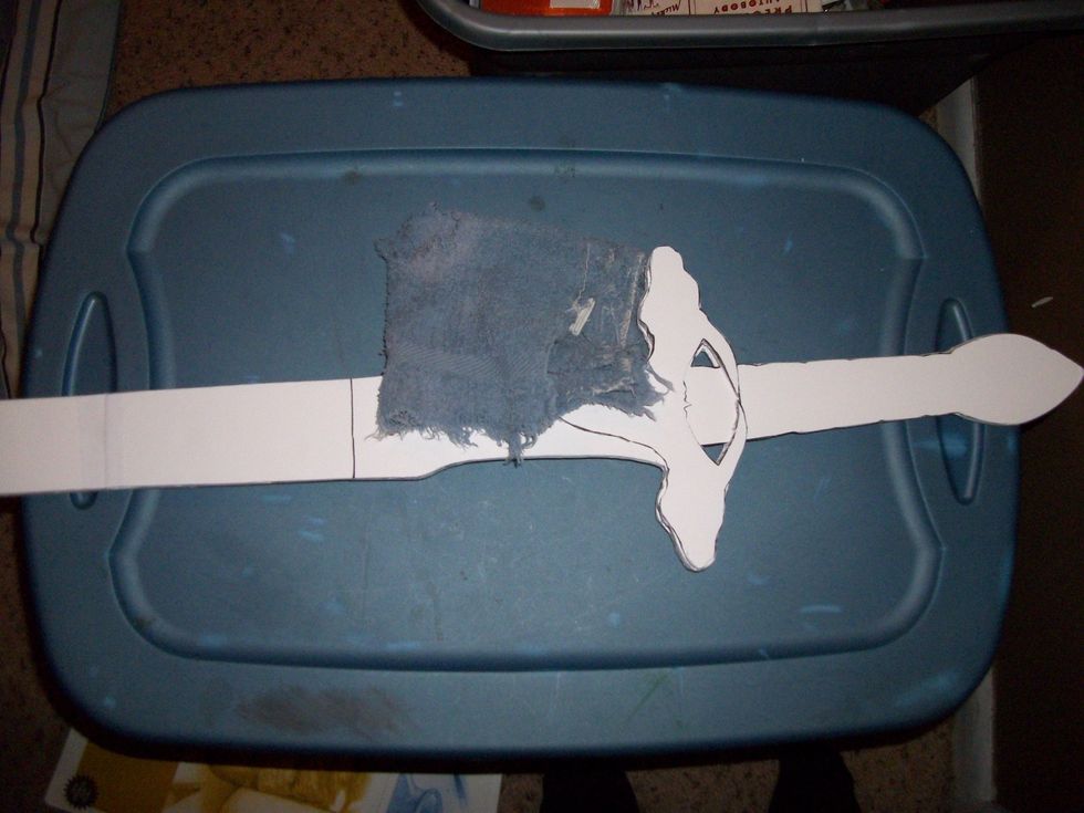 Use a rag or wash cloth to brush away any dust resulting from the sandpapering.