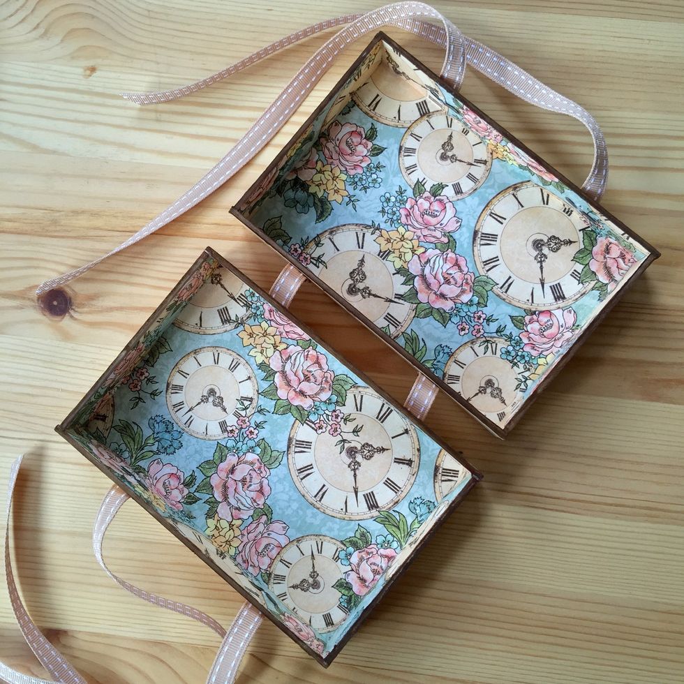 Use a ribbon and 8 brads to make the enclosure of the box.