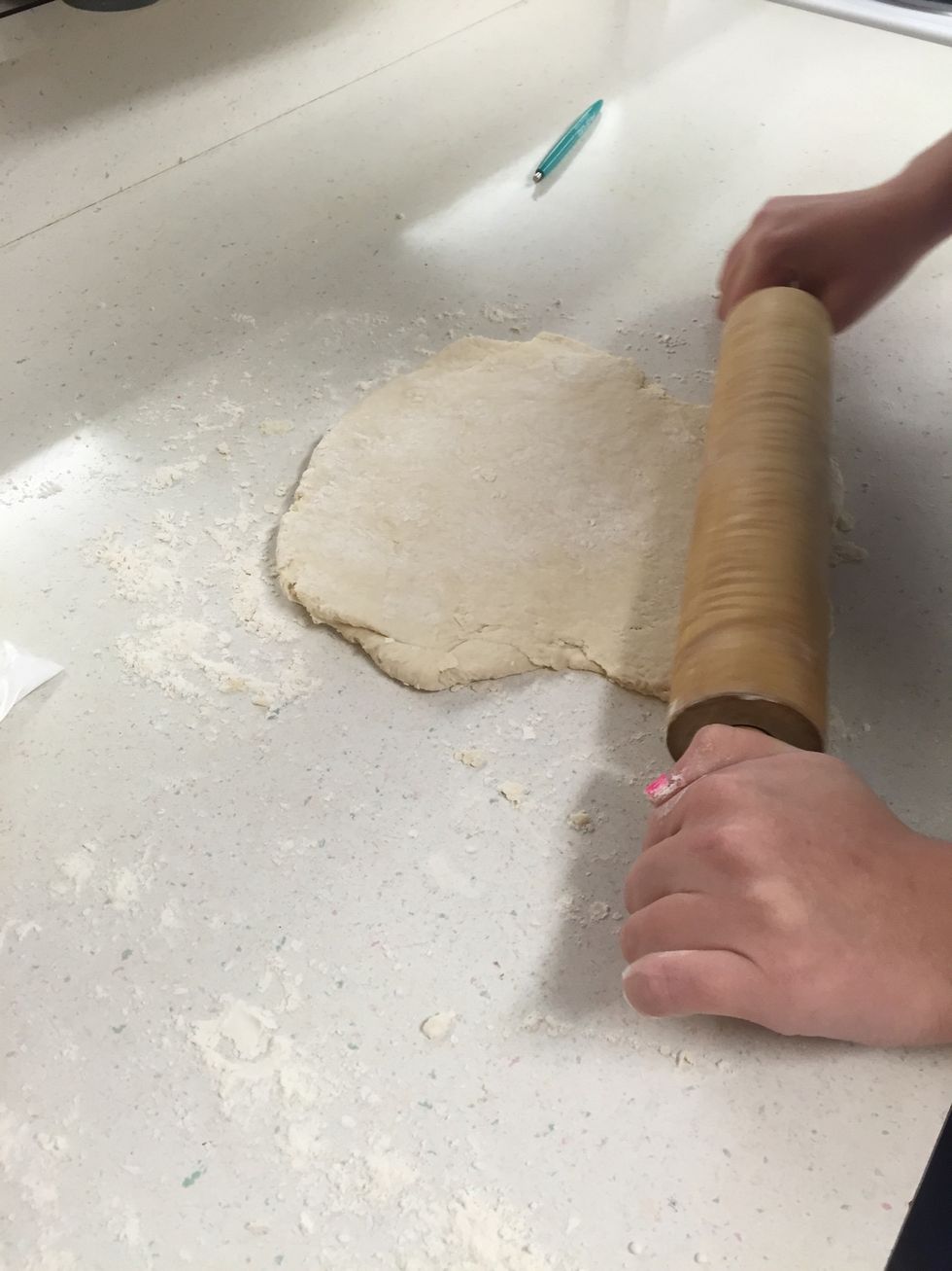 Use a rolling pin to roll in a 12 x 7 rectangle
