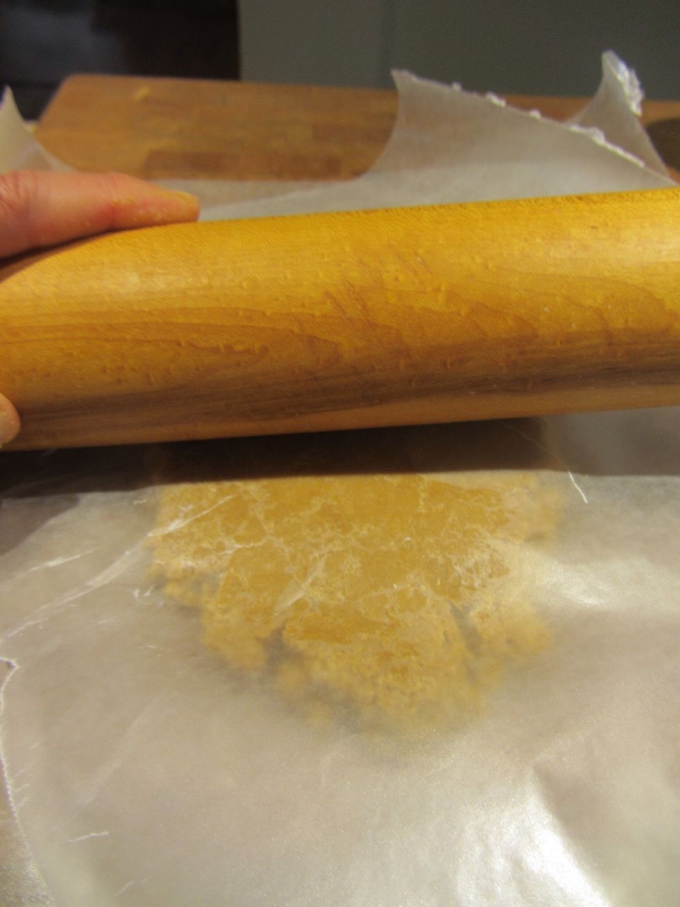 Use a rolling pin to roll out the dough to about 1/4 inch thickness.