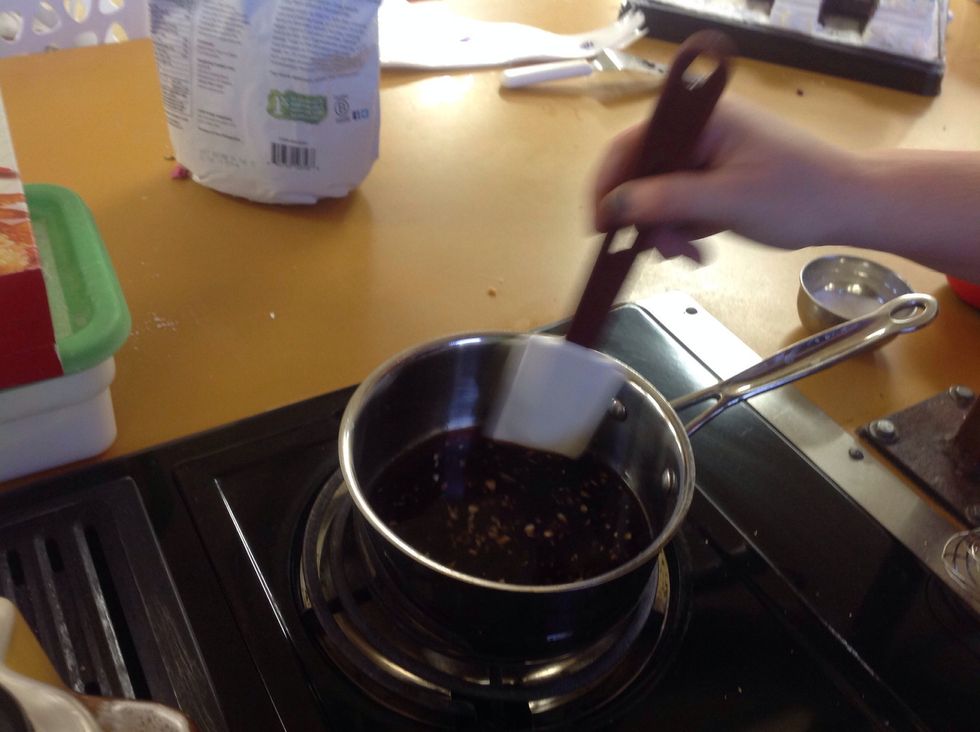 Use a rubber scrapper to mix the sauce. Be sure to scrape the bottom of the pot and sir it constantly! It will burn on the bottom if you do not stir.
