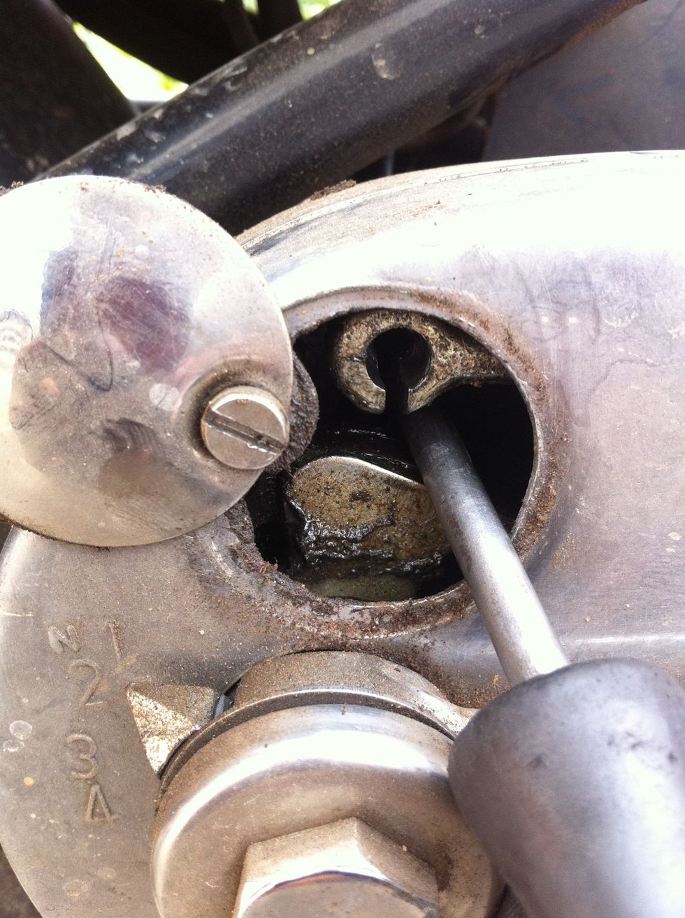 Use a screw driver and push the cable end seating out