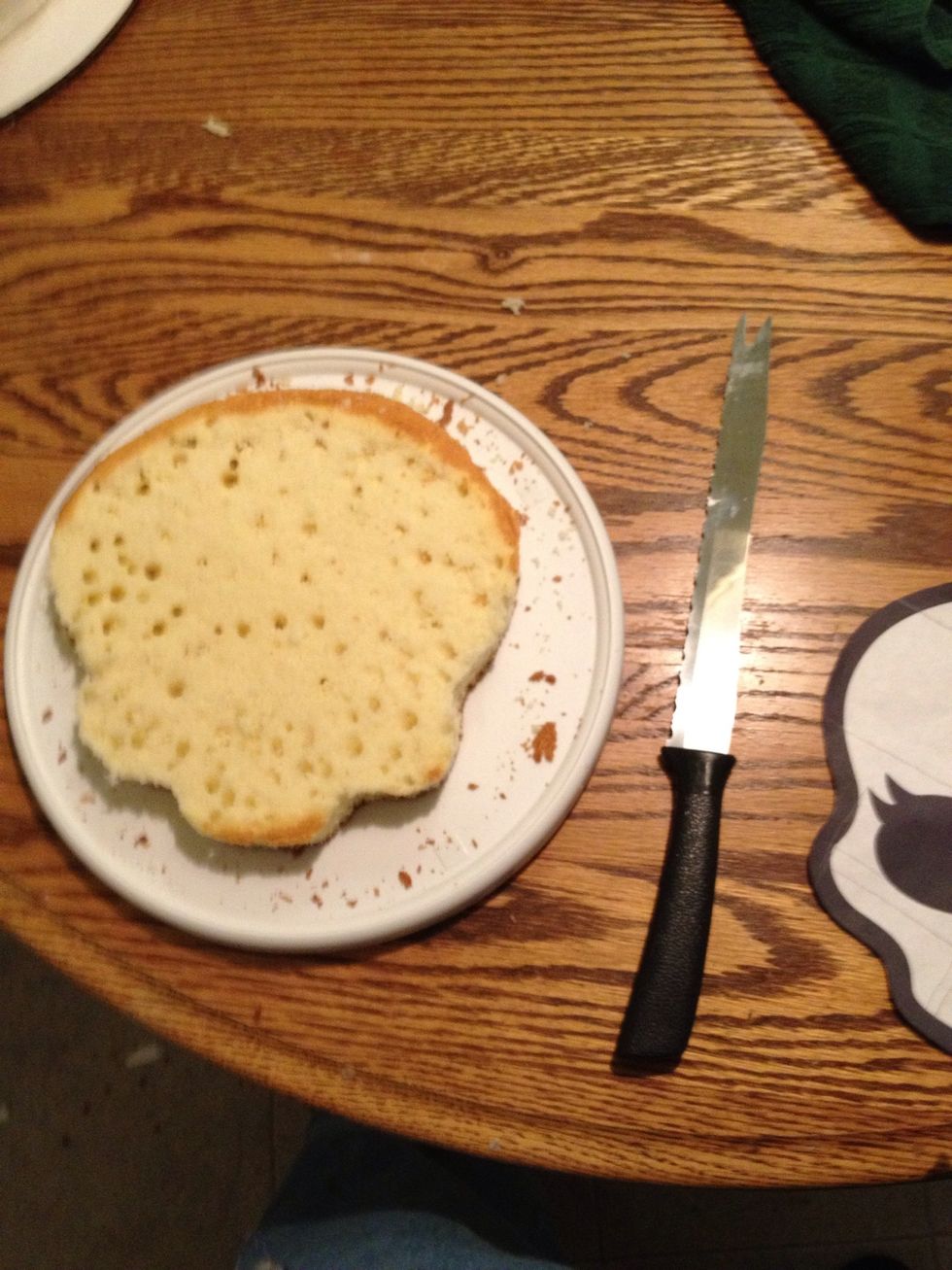Use a sharp-ended, serrated knife to cut the pattern into the cake.