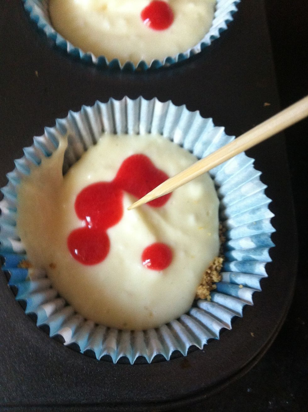 Use a skewer to swirl the tops of your cupcakes.