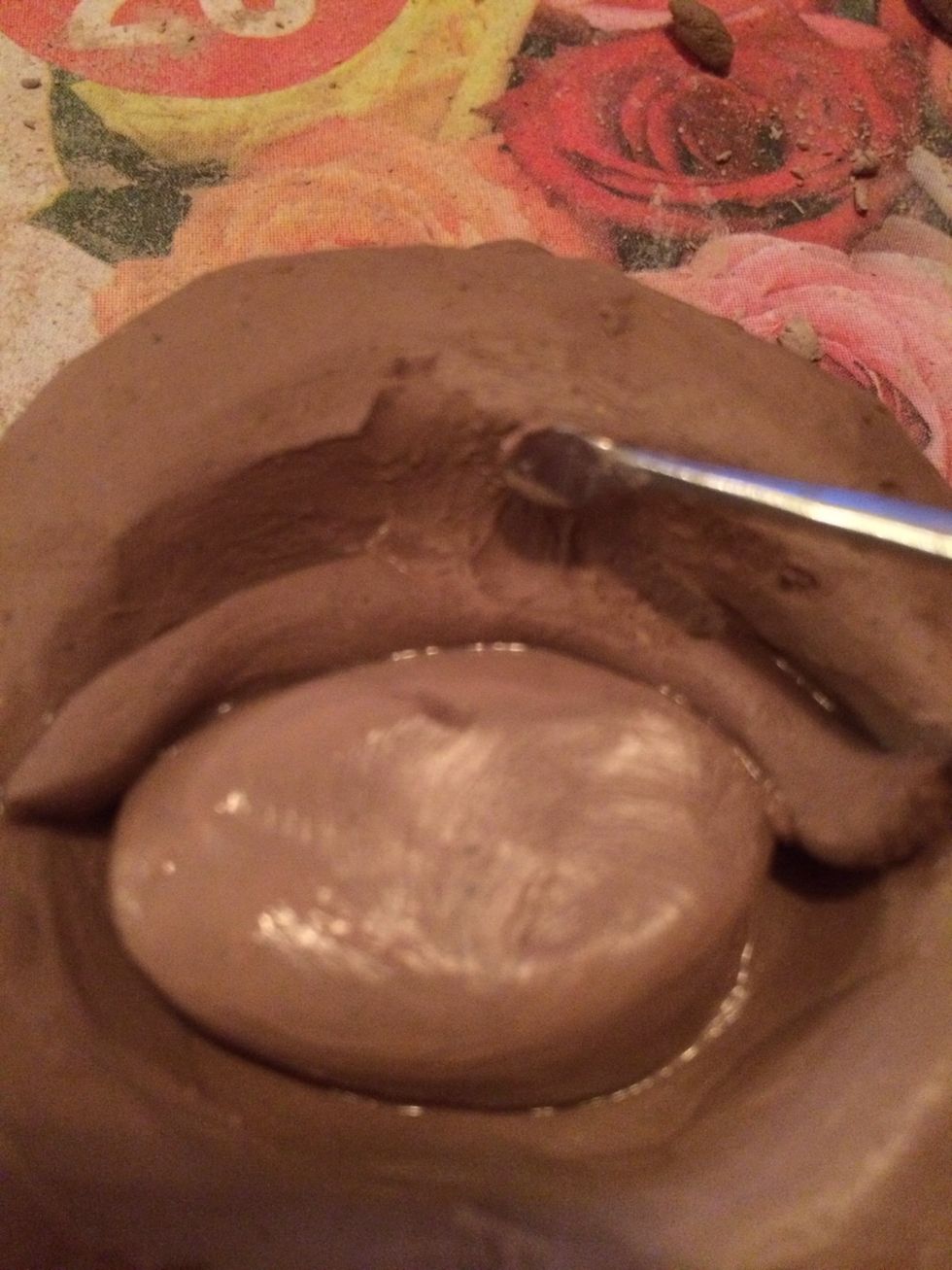 Use a small tool to smooth the top of the coil out so it appears to be part of the facial skin.