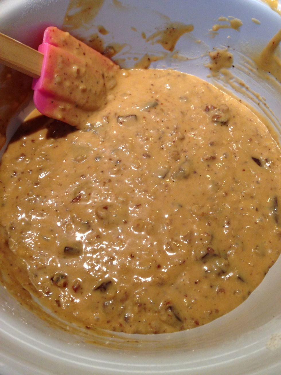 Use a spatula and fold in the dry ingredients.