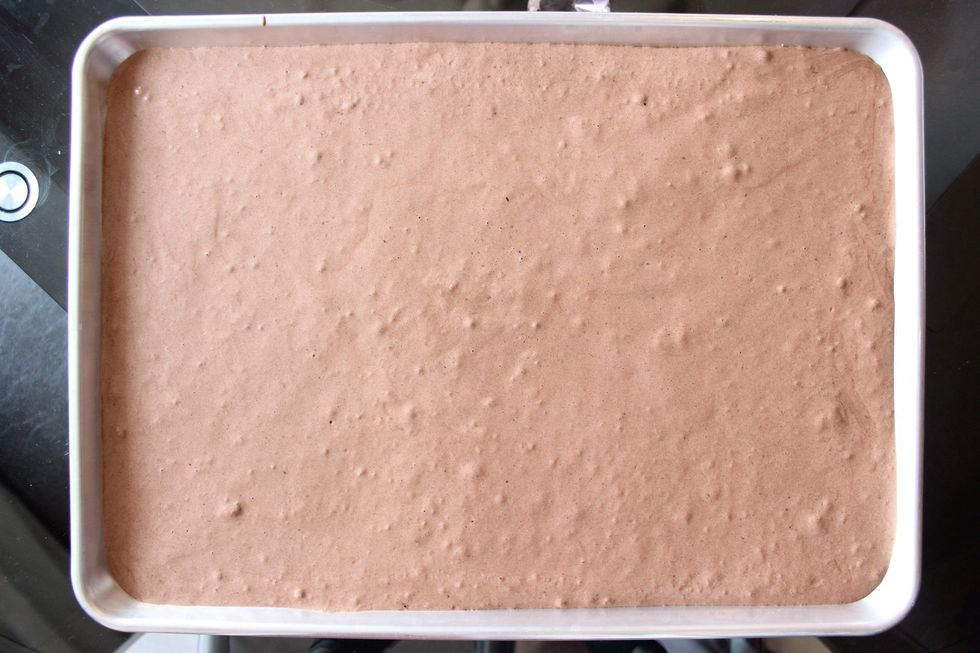 Use a spatula to even out the cake batter. Jiggling the pan lightly and tapping it on your counter will also help to even out the batter and remove any large uneven air bubbles. Now bake!