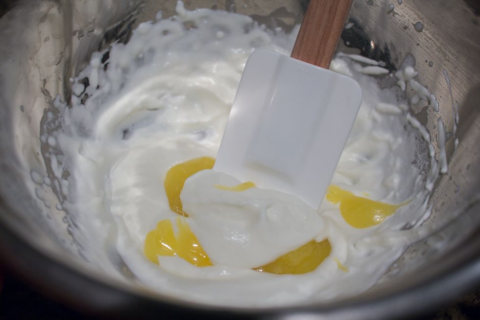 Use a spatula to fold the ingredients together. You can add more or less lemon curd until the mousse is to your desired taste.